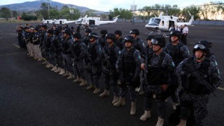 Federale troepe na hulle in Nueva Italia aangekom het. Foto: AFP