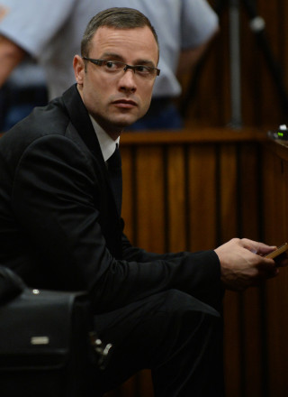 Oscar Pistorius op dag 10 van sy moordverhoor, 14 Maart 2014 Foto:  Phill Magakoe/Independent Newspapers Ltd/Pool (SAPA)