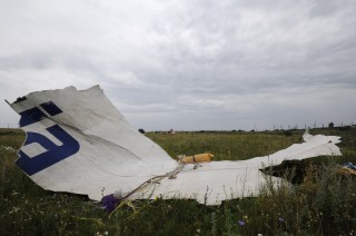 Foto: ŉ Wrakstuk van Vlug MH17 Foto: Dominique Faget/AFP/Getty Images