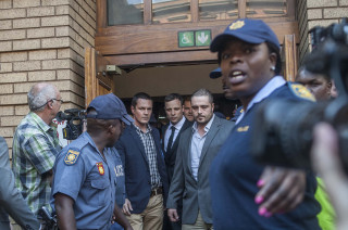 Oscar Pistorius buite die hooggeregshof in Pretoria in September 2014. Foto: Ihsaan Haffejee