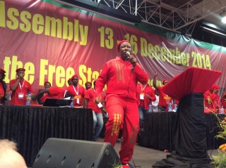 Julius Malema, leier van die EFF, op 14 Desember 2014 tydens die party se verkiesingskonferensie by die Universiteit van die Vrystaat in Bloemfontein Foto: Getrude Makhafola/Sapa