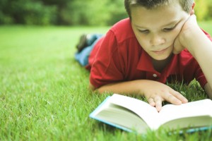 a-kid-reading_greatbooksacademy_org.jpg
