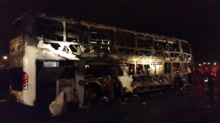 Die uitgebrande bus. Foto: ANA