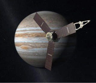 Kunstenaarsvoorstelling van Juno naby aan Jupiter. Grafika NASA/JPL/Caltech