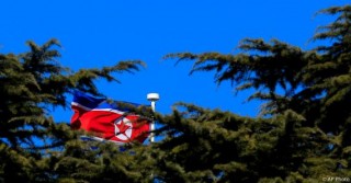 Noord-Korea se vlag wapper in die wind Foto; AP