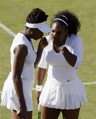 Venus en Serena Williams. foto: AP Photo/Kirsty Wigglesworth